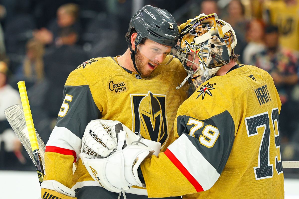 Vegas Golden Knights D Jeremy Lauzon (5) celebrates with his teammate Vegas Golden Knights G Carter Hart (79) after defeating the Winnipeg Jets on Monday, April 13, 2026, in Las Vegas, Nevada. 