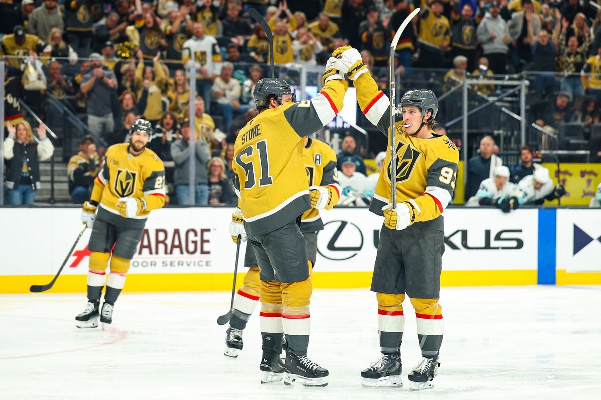 Vegas Golden Knights F Mitch Marner (93) high-fives his teammate F Mark Stone (61) after he scored a deflection goal against the Seattle Kraken on Wednesday, April 15, 2026, in Las Vegas, Nevada. Vegas Golden Knights F Mitch Marner (93) high-fives his teammate F Mark Stone (61) after he scored a deflection goal against the Seattle Kraken on Wednesday, April 15, 2026, in Las Vegas, Nevada.