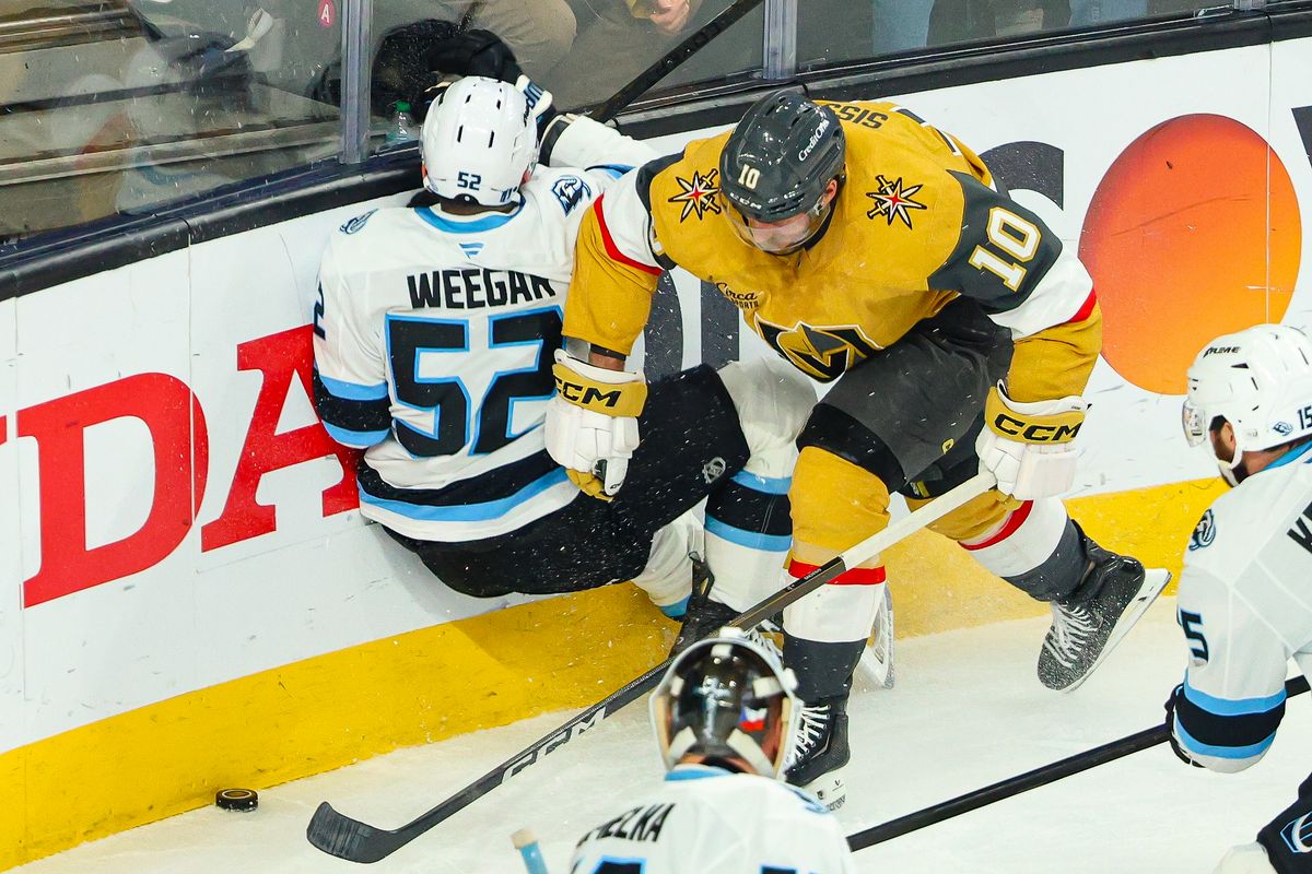 Vegas Golden Knights F Colton Sissons (10) lays a hit on Utah Mammoth D MacKenzie Weegar (52) during Round 1 Game 5 of the Stanley Cup Playoffs on Wednesday, April 29, 2026, in Las Vegas, Nevada. 