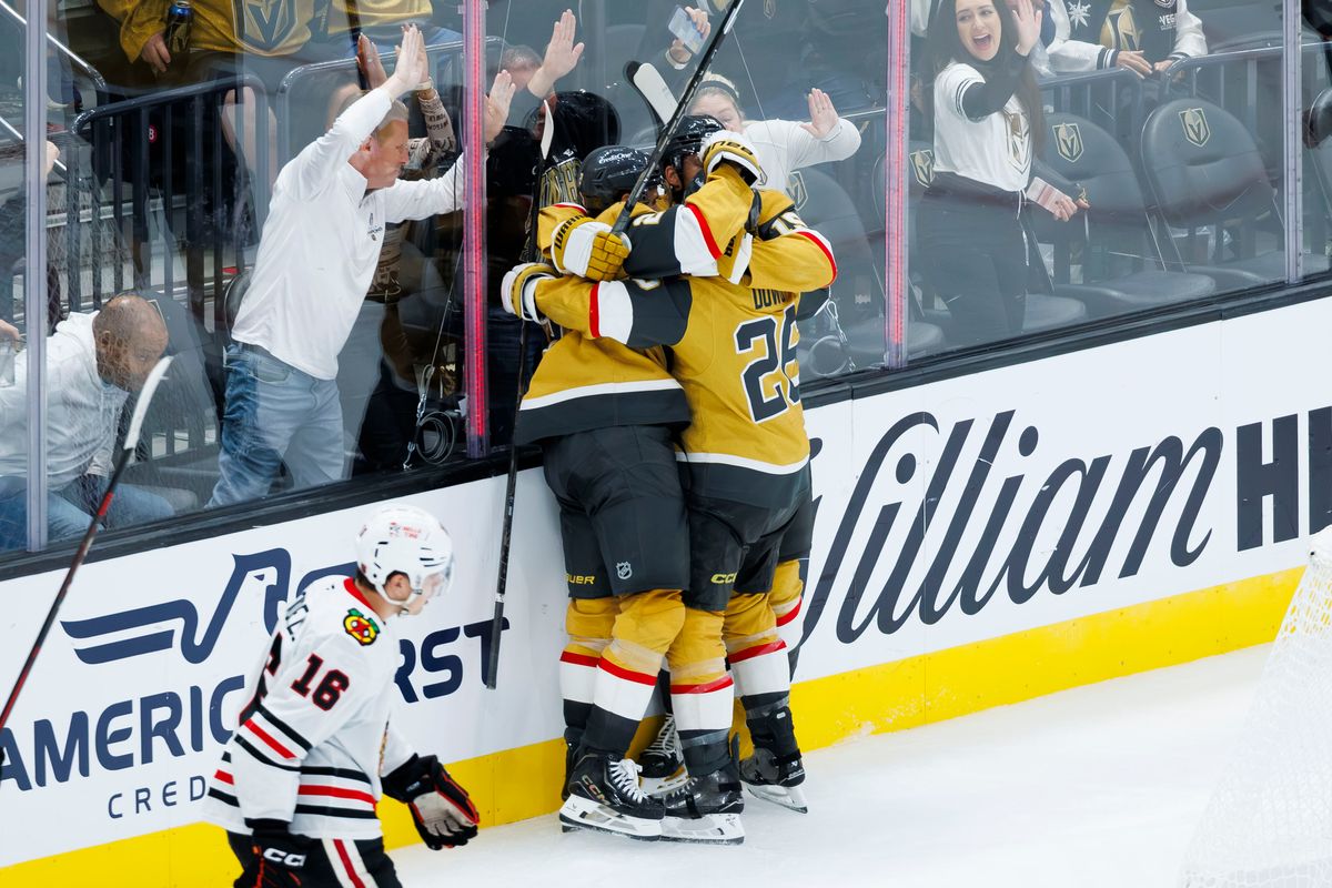 Vegas Golden Knights defenseman Noah Hanifin celebrates his first goal of the season with Vegas Golden Knights center Nic Dowd and Vegas Golden Knights center Brett Howden during a NHL game against the Chicago Blackhawks on Tuesday, Saturday 29, 2026, at T-Mobile Arena in Las Vegas, Nevada. Vegas Golden Knights defenseman Noah Hanifin celebrates his first goal of the season with Vegas Golden Knights center Nic Dowd and Vegas Golden Knights center Brett Howden during a NHL game against the Chicago Blackhawks on Tuesday, Saturday 29, 2026, at T-Mobile Arena in Las Vegas, Nevada.