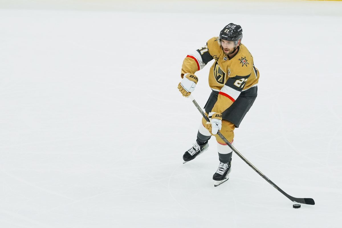 Vegas Golden Knights defenseman Shea Theodore (27) prepares to pass the puck during first period of NHL game against Calgary Flames on Thursday October 15, 2026 at T-Mobile Arena in Las Vegas. Vegas Golden Knights defenseman Shea Theodore (27) prepares to pass the puck during first period of NHL game against Calgary Flames on Thursday October 15, 2026 at T-Mobile Arena in Las Vegas.