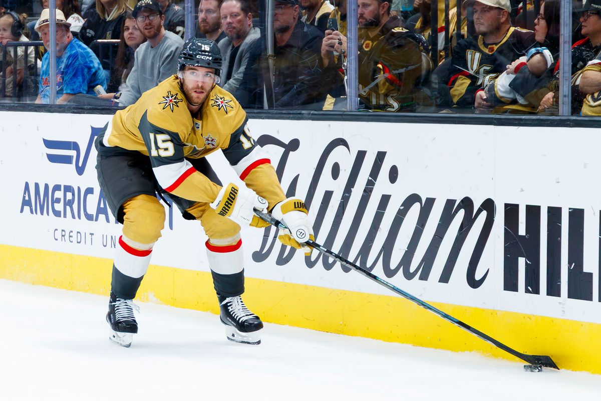 Vegas Golden Knights defenseman Noah Hanifin (15) rims the puck around the boards during an NHL game against the Pittsburgh Penguins on October 17, 2026 at T-Mobile Arena. Vegas Golden Knights defenseman Noah Hanifin (15) rims the puck around the boards during an NHL game against the Pittsburgh Penguins on October 17, 2026 at T-Mobile Arena.