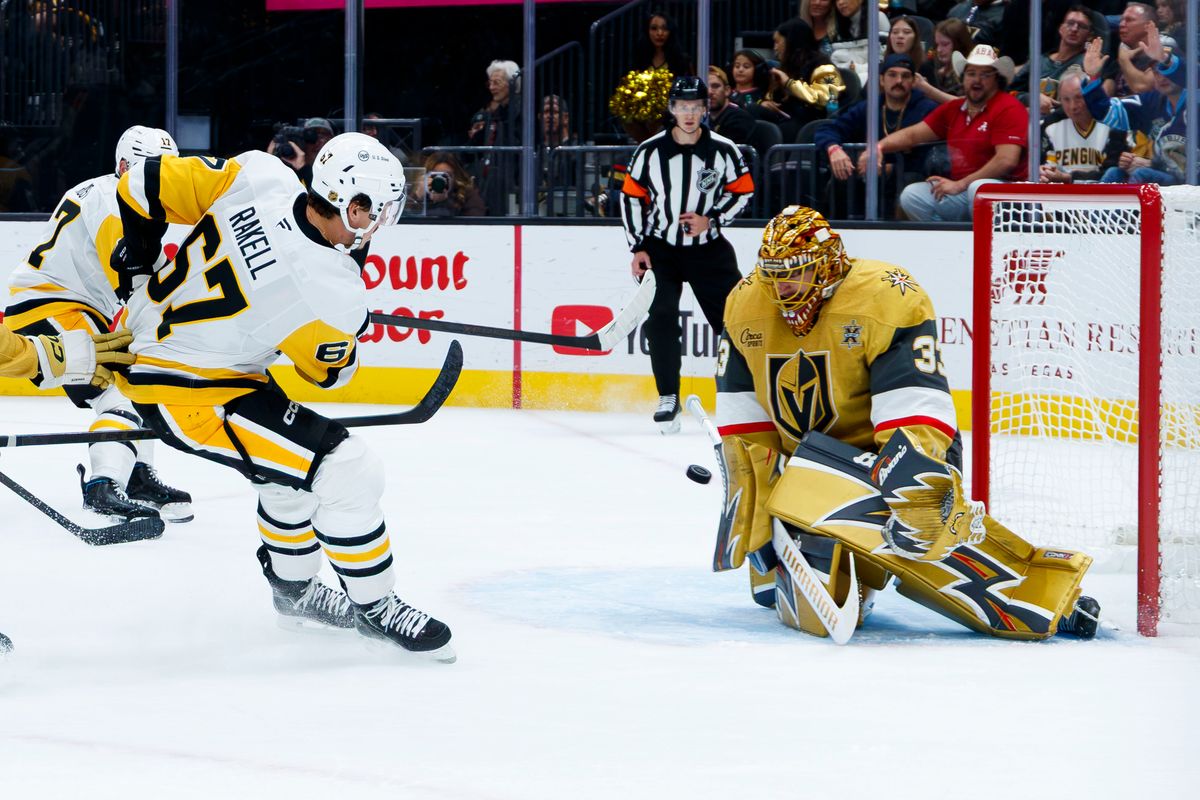 Vegas Golden Knights goaltender Adin Hill (33) blocks a shot from Pittsburgh Penguins right wing Rickard Rakell (67) during an NHL game against the Pittsburgh Penguins on October 17, 2026 at T-Mobile Arena. Vegas Golden Knights goaltender Adin Hill (33) blocks a shot from Pittsburgh Penguins right wing Rickard Rakell (67) during an NHL game against the Pittsburgh Penguins on October 17, 2026 at T-Mobile Arena.