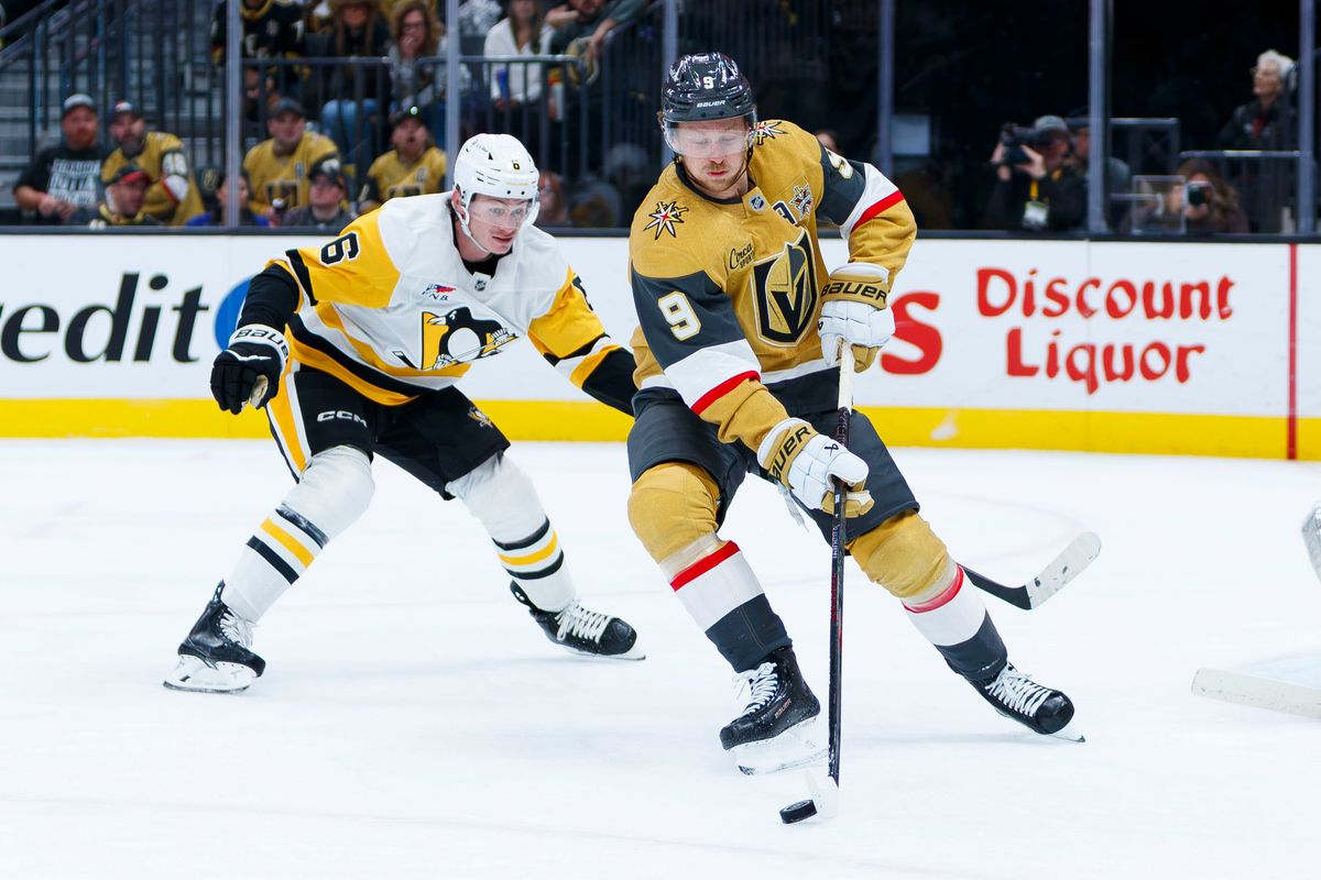 Vegas Golden Knights center Jack Eichel (9) picks up the puck in the defensive zone during an NHL game against the Pittsburgh Penguins on October 17, 2026 at T-Mobile Arena. Vegas Golden Knights center Jack Eichel (9) picks up the puck in the defensive zone during an NHL game against the Pittsburgh Penguins on October 17, 2026 at T-Mobile Arena.