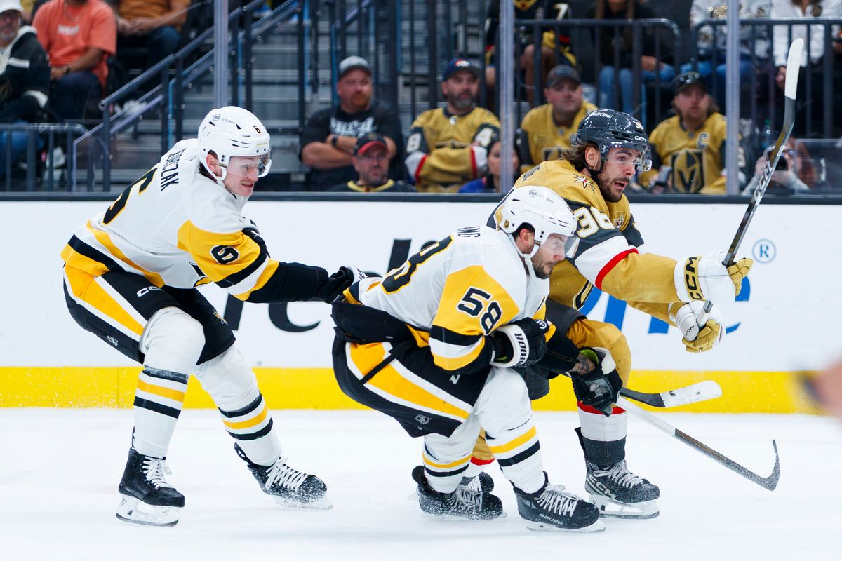 Vegas Golden Knights center Raphael Lavoie (36) fights off Pittsburgh Penguins defenseman Kris Letang (58) and Pittsburgh Penguins defenseman Kaedan Korczak (6) during an NHL game against the Pittsburgh Penguins on October 17, 2026 at T-Mobile Arena. Vegas Golden Knights center Raphael Lavoie (36) fights off Pittsburgh Penguins defenseman Kris Letang (58) and Pittsburgh Penguins defenseman Kaedan Korczak (6) during an NHL game against the Pittsburgh Penguins on October 17, 2026 at T-Mobile Arena.