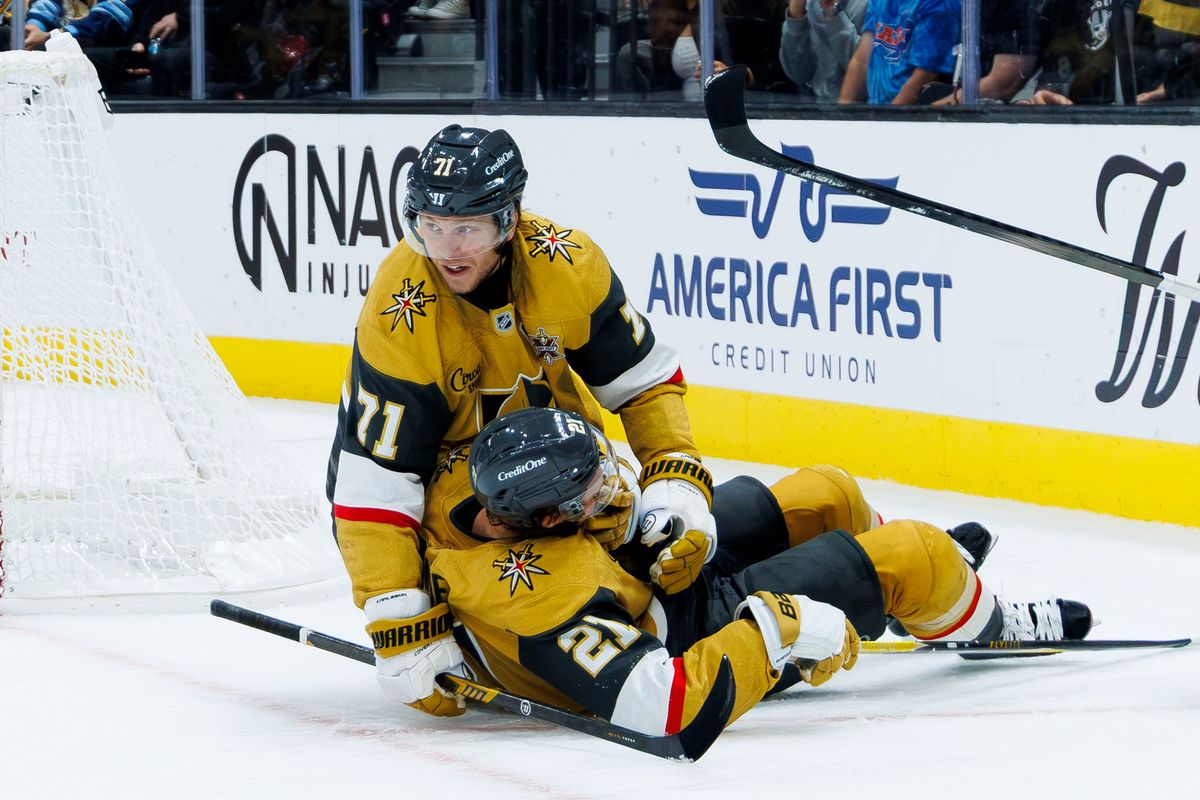 Vegas Golden Knights center Brett Howden (21) and Vegas Golden Knights center William Karlsson (71) celebrate an awarded empty-net goal during an NHL game against the Pittsburgh Penguins on October 17, 2026 at T-Mobile Arena. Vegas Golden Knights center Brett Howden (21) and Vegas Golden Knights center William Karlsson (71) celebrate an awarded empty-net goal during an NHL game against the Pittsburgh Penguins on October 17, 2026 at T-Mobile Arena.