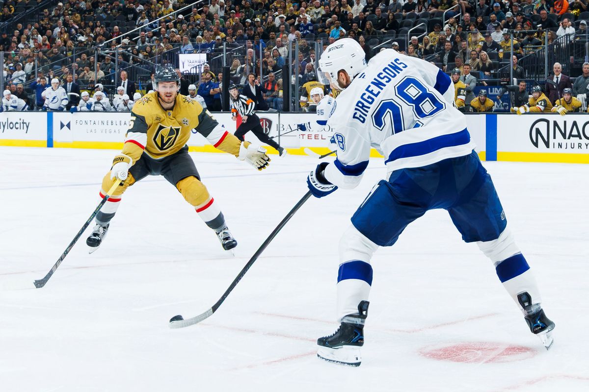 Tampa Bay Lightning center Zemgus Girgensons (28) sends the puck out of the offensive zone on the penalty kill during an NHL game against the Vegas Golden Knights on Tuesday, October 20, 2026, at T-Mobile Arena in Las Vegas, Nevada. Tampa Bay Lightning center Zemgus Girgensons (28) sends the puck out of the offensive zone on the penalty kill during an NHL game against the Vegas Golden Knights on Tuesday, October 20, 2026, at T-Mobile Arena in Las Vegas, Nevada.