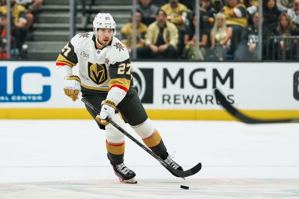 Vegas Golden Knights defenseman Shea Theodore (27) scans the ice during second period of NHL game against New Jersey Devils on Friday October 30, 2026 at T-Mobile Arena in Las Vegas. Vegas Golden Knights defenseman Shea Theodore (27) scans the ice during second period of NHL game against New Jersey Devils on Friday October 30, 2026 at T-Mobile Arena in Las Vegas.