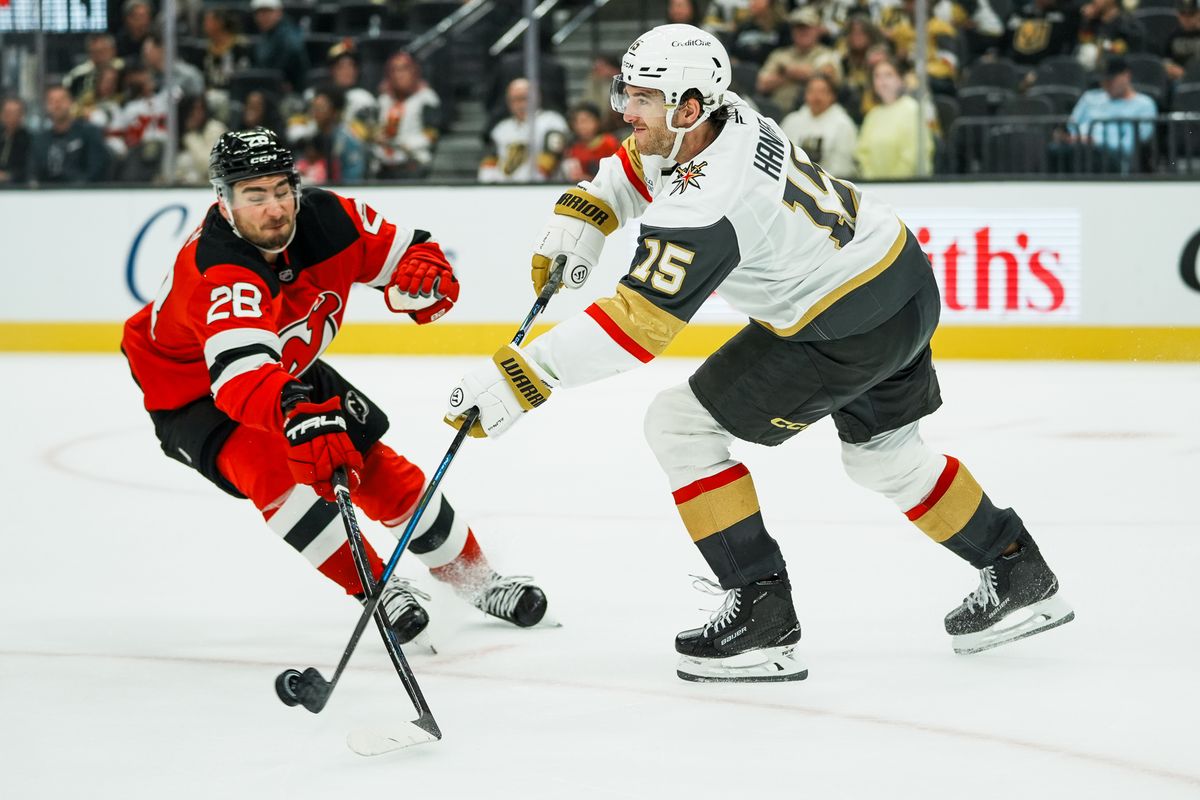 Vegas Golden Knights defenseman Noah Hanifin (15) passes the puck over New Jersey Devils right wing Timo Meier (28) during third period of NHL game against New Jersey Devils on Friday October 30, 2026 at T-Mobile Arena in Las Vegas. Vegas Golden Knights defenseman Noah Hanifin (15) passes the puck over New Jersey Devils right wing Timo Meier (28) during third period of NHL game against New Jersey Devils on Friday October 30, 2026 at T-Mobile Arena in Las Vegas.