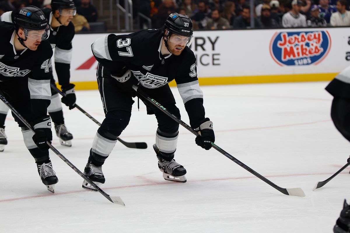 Los Angeles Kings left wing Warren Foegele (57) during a face-off during game against Vancouver Canucks on Thursday, November 7, 2024 in Los Angeles. Los Angeles Kings left wing Warren Foegele (57) during a face-off during game against Vancouver Canucks on Thursday, November 7, 2024 in Los Angeles.