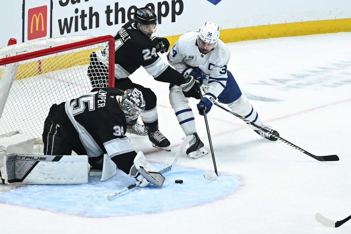 Toronto Maples Leafs Center Auston Matthews (34) takes a shot in close against Los Angeles Kings Goalie Darcy Kuemper during an NHL hockey game against the Los Angeles Kings, Saturday, March 29, 2025, in Los Angeles Calif. Toronto Maples Leafs Center Auston Matthews (34) takes a shot in close against Los Angeles Kings Goalie Darcy Kuemper during an NHL hockey game against the Los Angeles Kings, Saturday, March 29, 2025, in Los Angeles Calif.