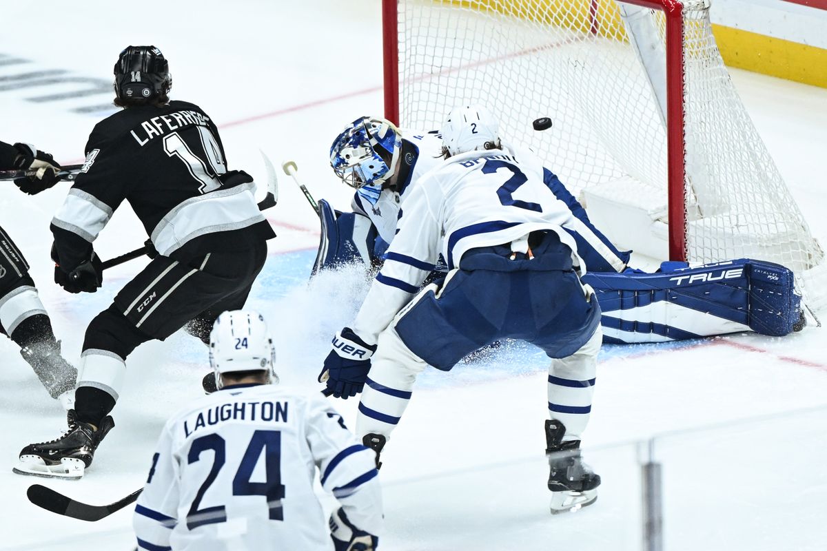 Los Angeles Kings Right Winger Alex Lafferiere (14) scores a backhand goal during an NHL hockey game against the Toronto Maple Leafs, Saturday, March 29, 2025, in Los Angeles Calif. Los Angeles Kings Right Winger Alex Lafferiere (14) scores a backhand goal during an NHL hockey game against the Toronto Maple Leafs, Saturday, March 29, 2025, in Los Angeles Calif.