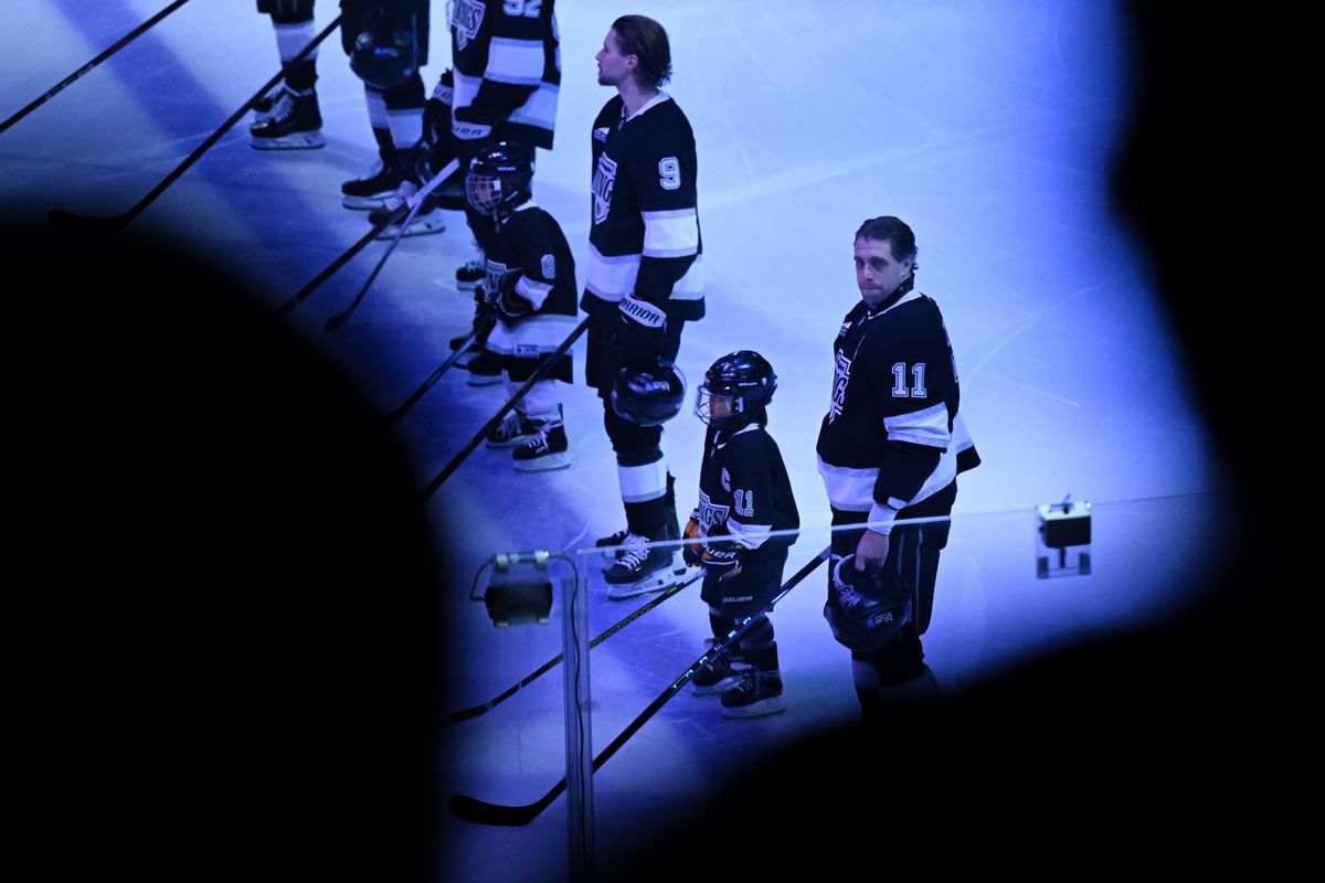 Los Angeles Kings Center Anze Kopitar (11) and Right Winger Adrian Kempe (9) stand for the U.S. and Canadian national anthems before an NHL hockey game against the Toronto Maple Leafs, Saturday, March 29, 2025, in Los Angeles Calif. Los Angeles Kings Center Anze Kopitar (11) and Right Winger Adrian Kempe (9) stand for the U.S. and Canadian national anthems before an NHL hockey game against the Toronto Maple Leafs, Saturday, March 29, 2025, in Los Angeles Calif.