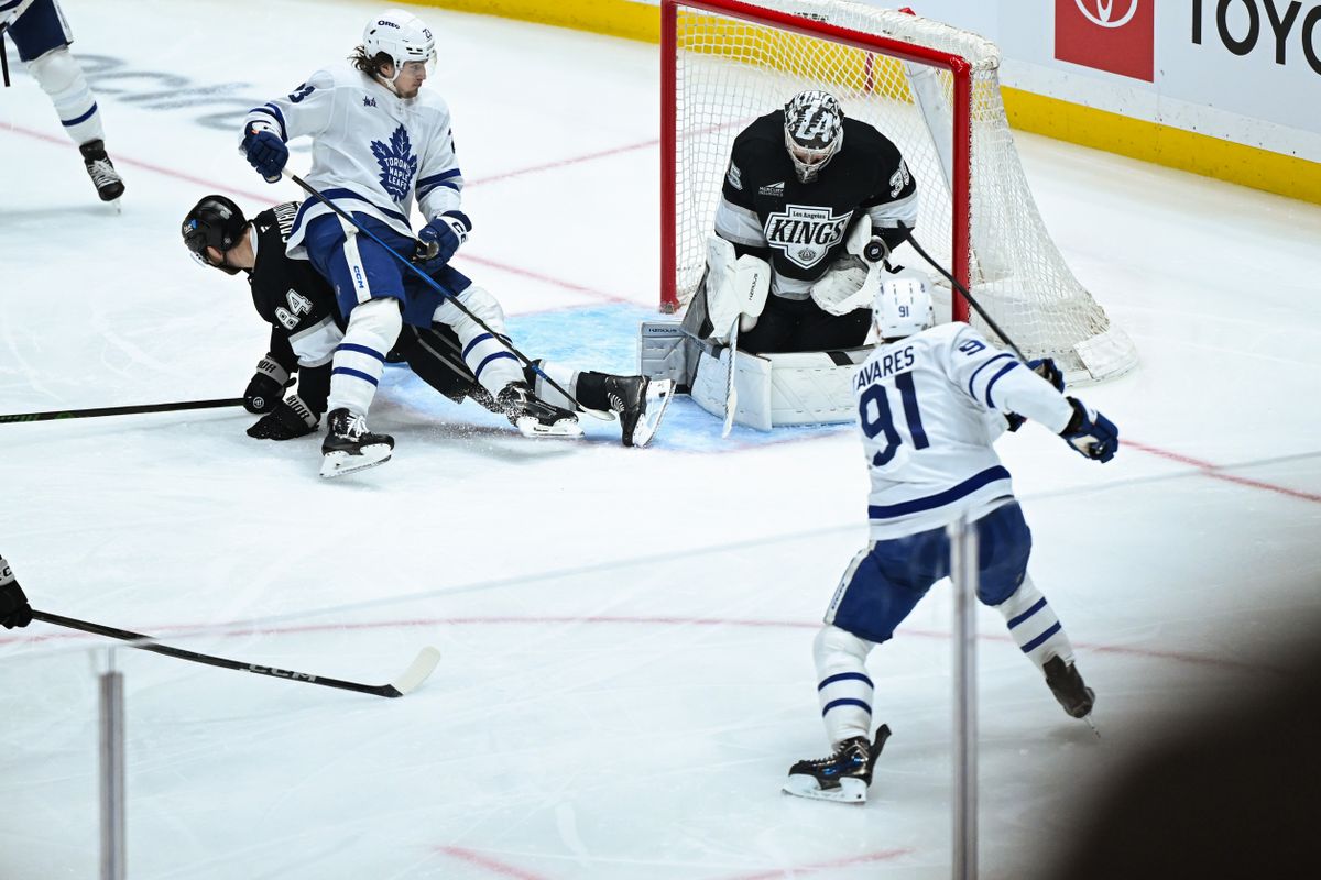 Los Angeles Kings Goalie Darcy Kuemper (35) makes a save on Toronto Maple Leafs Center John Tavares (91) during an NHL hockey game against the Toronto Maples Leafs, Saturday, March 29, 2025, in Los Angeles Calif. Los Angeles Kings Goalie Darcy Kuemper (35) makes a save on Toronto Maple Leafs Center John Tavares (91) during an NHL hockey game against the Toronto Maples Leafs, Saturday, March 29, 2025, in Los Angeles Calif.