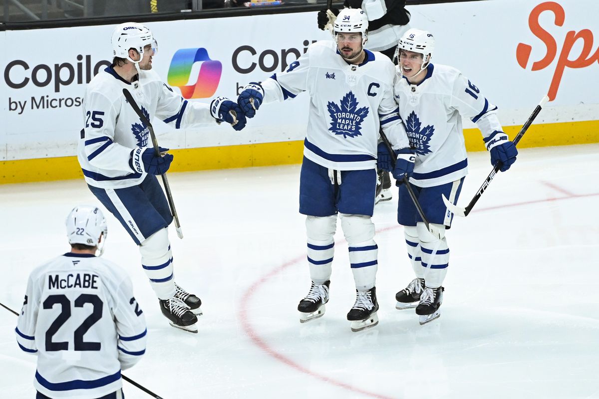 Toronto Maples Leafs Center Auston Matthews (34), Right Winger Mitch Marner (16), and Defenseman Brandon Carlo (25) celebrate Matthews' goal during an NHL hockey game against the Los Angeles Kings, Saturday, March 29, 2025, in Los Angeles Calif. Toronto Maples Leafs Center Auston Matthews (34), Right Winger Mitch Marner (16), and Defenseman Brandon Carlo (25) celebrate Matthews' goal during an NHL hockey game against the Los Angeles Kings, Saturday, March 29, 2025, in Los Angeles Calif.