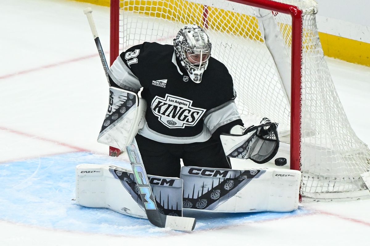 Los Angeles Kings Goalie David Rittich (31) saves a shot during an NHL hockey game against the San Jose Sharks, Sunday, March 30, 2025, in Los Angeles Calif.