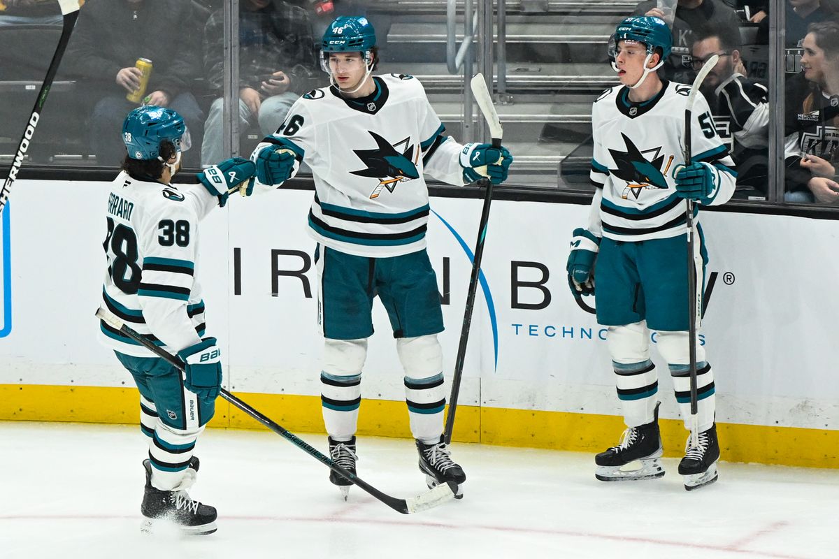 San Jose Sharks Defenseman Mario Ferraro (38), Center Cam Lund (46), and Right Winger Collin Graf (51) celebrate after Lund's goal during an NHL hockey game against the Los Angeles Kings, Sunday, March 30, 2025, in Los Angeles Calif.