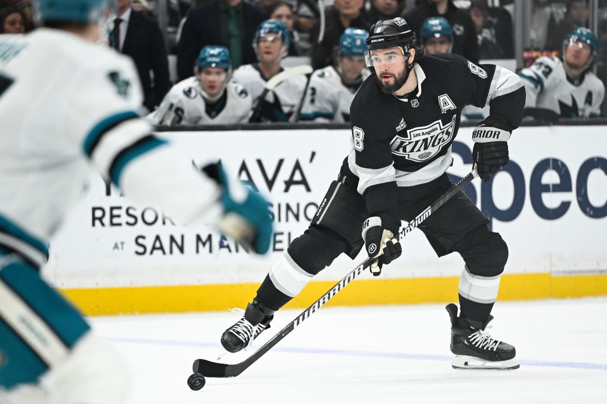Los Angeles Kings Defenseman Drew Doughty (8) passes the puck in the offensive zone during an NHL hockey game against the San Jose Sharks, Sunday, March 30, 2025, in Los Angeles Calif.