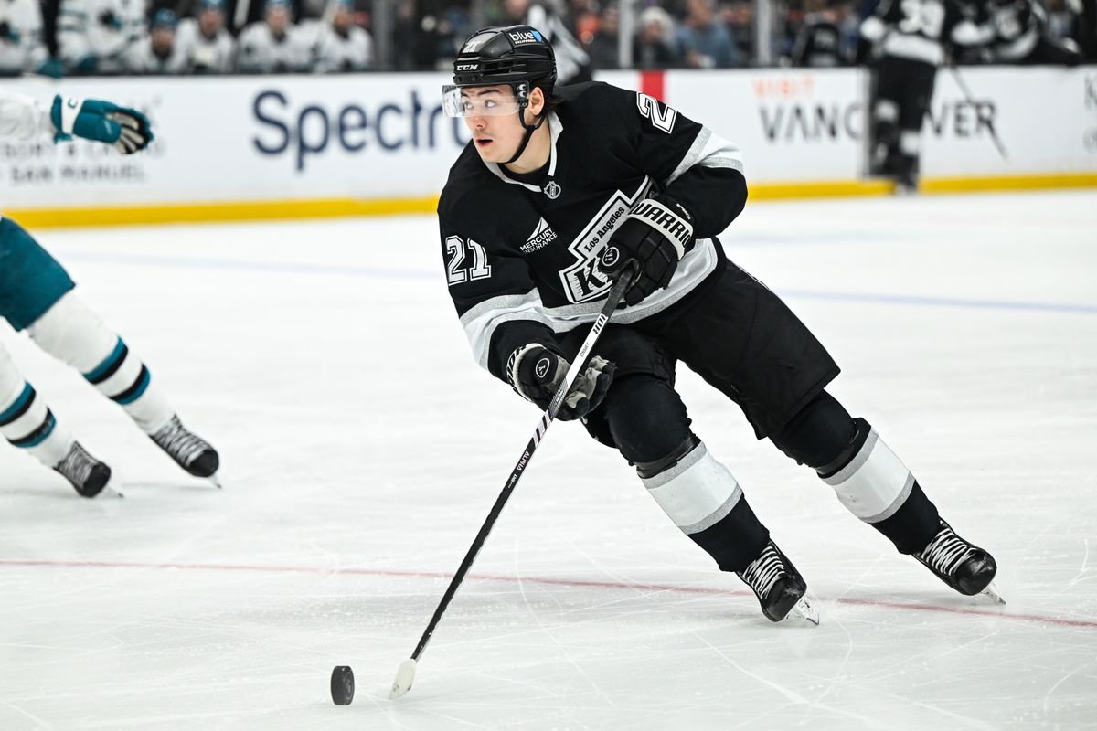 Los Angeles Kings Defenseman Jordan Spence (21) cycles the puck during an NHL hockey game against the San Jose Sharks, Sunday, March 30, 2025, in Los Angeles Calif.