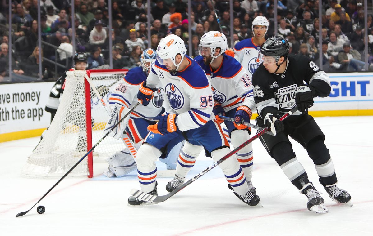 Los Angeles Kings LW (96) Andrei Kuzmenko battles for the puck against the Edmonton Oilers on April 5, 2025 at Crypto.com Arena. Los Angeles Kings LW (96) Andrei Kuzmenko battles for the puck against the Edmonton Oilers on April 5, 2025 at Crypto.com Arena.