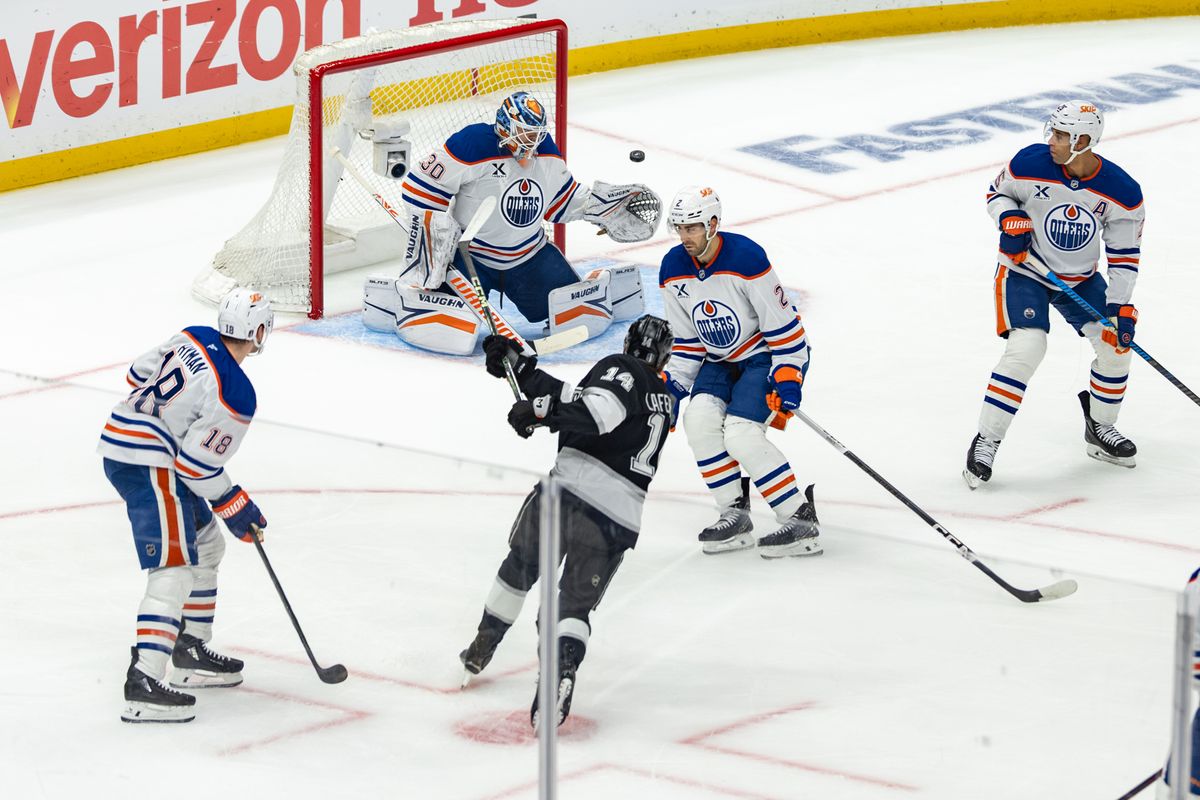 Los Angeles Kings forward Alex Laferriere (14) shoots the puck during Game 5 of the NHL Stanley Cup Playoffs against the Edmonton Oilers, Tuesday April 29, 2025 in Los Angeles, Calif.