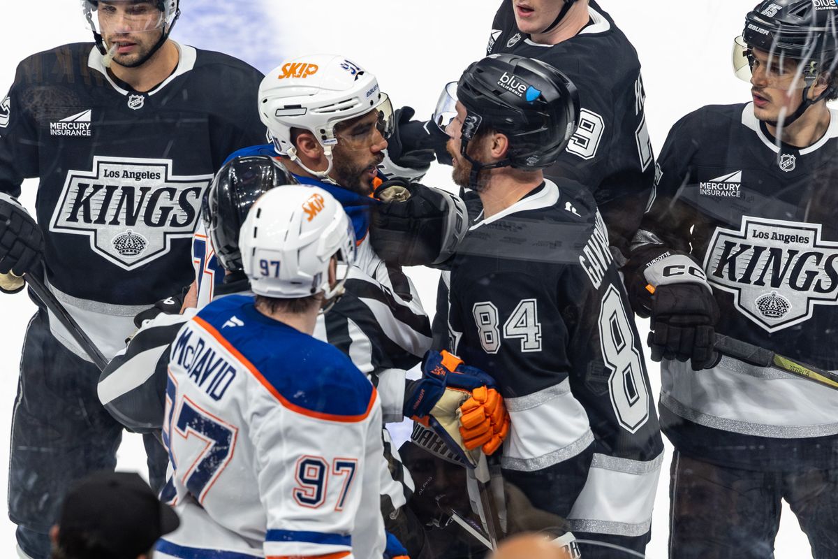 Edmonton Oilers forward Evander Kane (91) and Los Angeles Kings defenseman Vladislav Gavrikov (84) have a disagreement during Game 5 of the NHL Stanley Cup Playoffs, Tuesday April 29, 2025 in Los Angeles, Calif. 