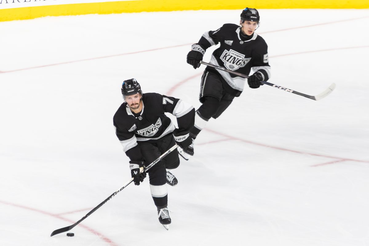 Los Angeles Kings defense Jakub Dvorak (51) and Kyle Burroughs (7) looks to pass the puck during an NHL hockey game against the Anaheim Ducks, Sunday September 21, 2025 in Ontario, Calif. Los Angeles Kings defense Jakub Dvorak (51) and Kyle Burroughs (7) looks to pass the puck during an NHL hockey game against the Anaheim Ducks, Sunday September 21, 2025 in Ontario, Calif.