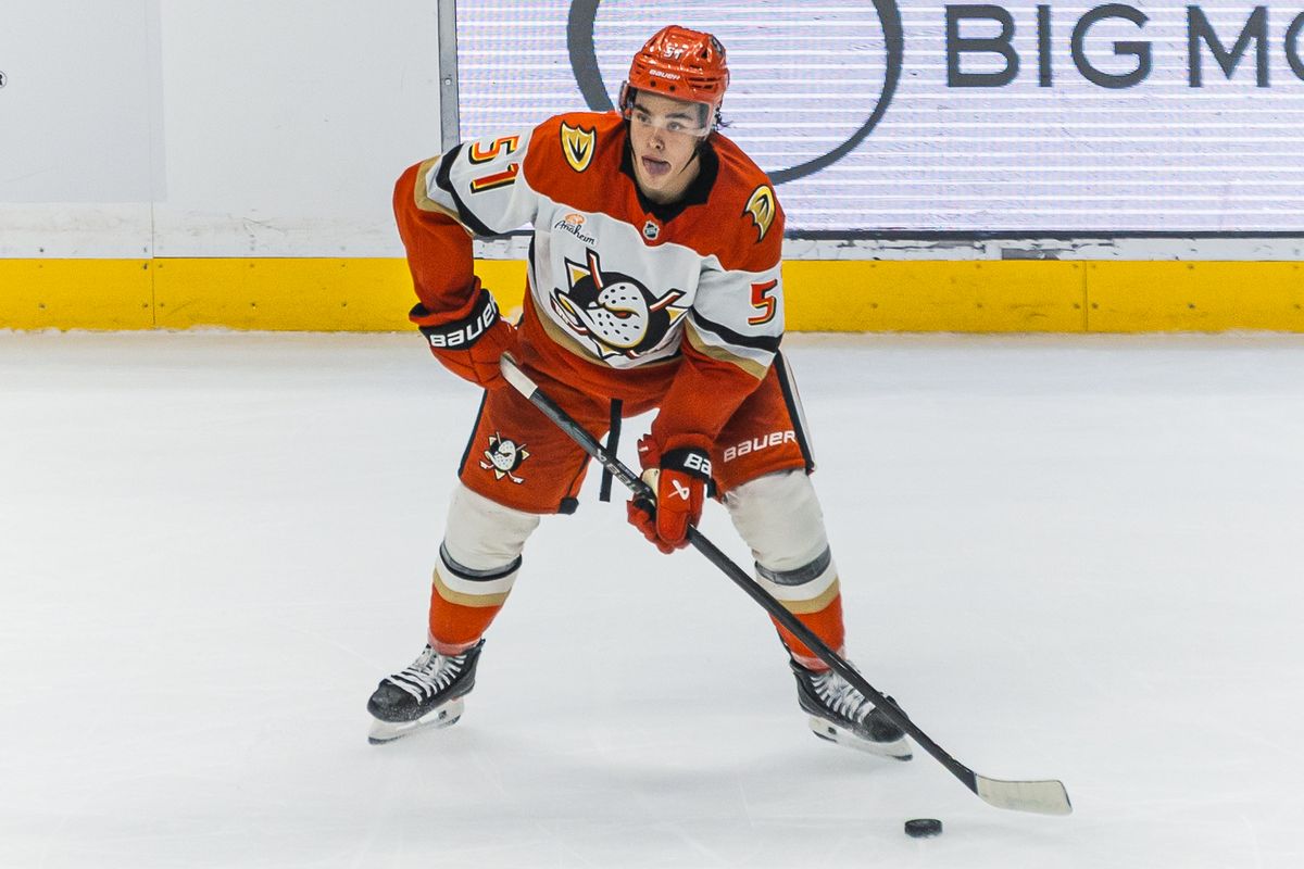 Anaheim Ducks Olen Zellweger (51) looks to pass the puck during an NHL hockey game against the Los Angeles Kings,  Saturday October 4, 2025 in Los Angeles, Calif.