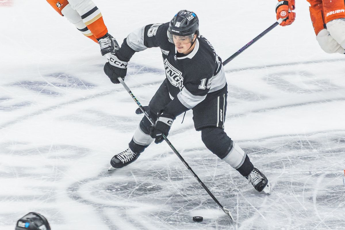 Los Angeles Kings Alex Turcotte (15) looks to pass the puck during an NHL hockey game against the Anaheim Ducks, Saturday October 4, 2025 in Los Angeles, Calif.