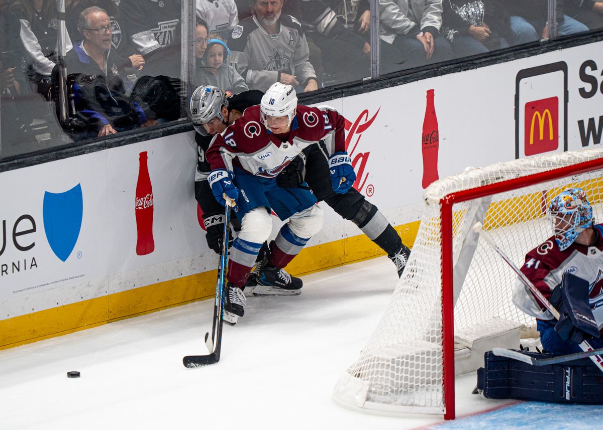 Los Angeles Kings left wing, Jeff Malott 39, fights for the puck with Avalanche Jack Drury 18 during an NHL hockey game against the Colorado Avalanche at Crypto.com Arena in Los Angeles on October 07, 2025