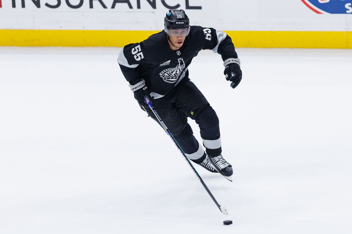 Los Angeles Kings C Quinton Byfield (55) skates up with the puck during an NHL game against the Carolina Hurricanes at the Crypto.com Arena on October 18, 2025 in Los Angeles, California.