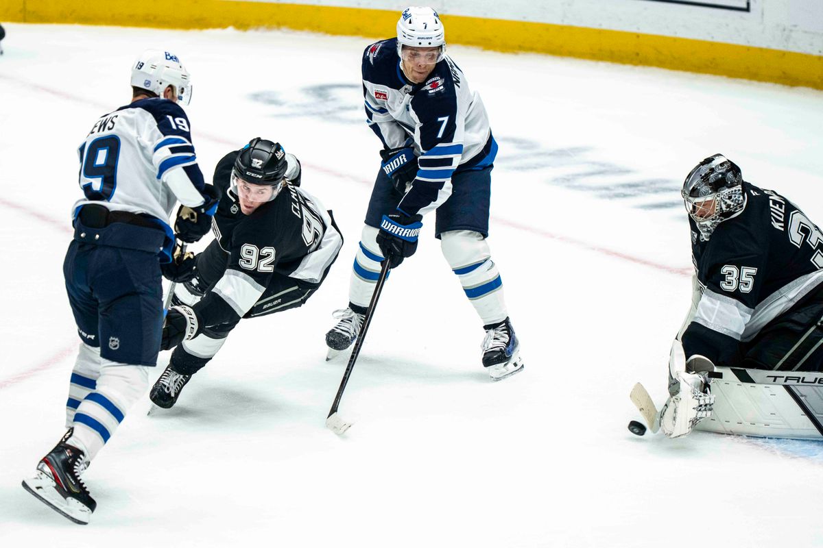 Los Angeles Kings defenseman, Brandt Clarke (92) assists with a goal save during an NHL hockey game between the Winnipeg Jets and Los Angeles Kings, Tuesday November 4, 2025 in Los Angeles. Los Angeles Kings defenseman, Brandt Clarke (92) assists with a goal save during an NHL hockey game between the Winnipeg Jets and Los Angeles Kings, Tuesday November 4, 2025 in Los Angeles.
