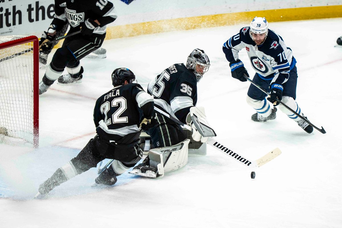 Los Angeles Kings forward, Kevin Fiala (22) assists a goal save during an NHL hockey game between the Winnipeg Jets and Los Angeles Kings, Tuesday November 4, 2025 in Los Angeles. Los Angeles Kings forward, Kevin Fiala (22) assists a goal save during an NHL hockey game between the Winnipeg Jets and Los Angeles Kings, Tuesday November 4, 2025 in Los Angeles.