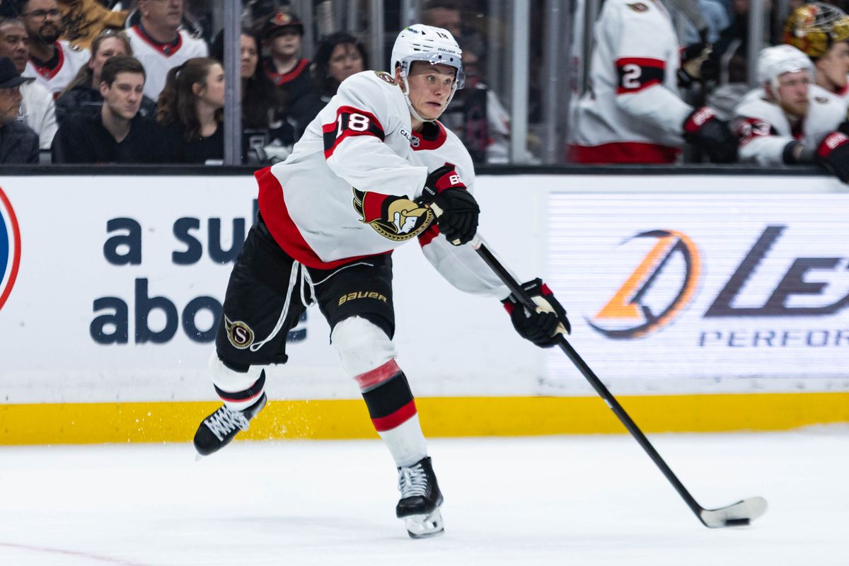 Ottawa Senators center Tim Stutzle (18) passes the puck during an NHL game against the Los Angeles Kings on November 24, 2025 in Los Angeles, Calif.