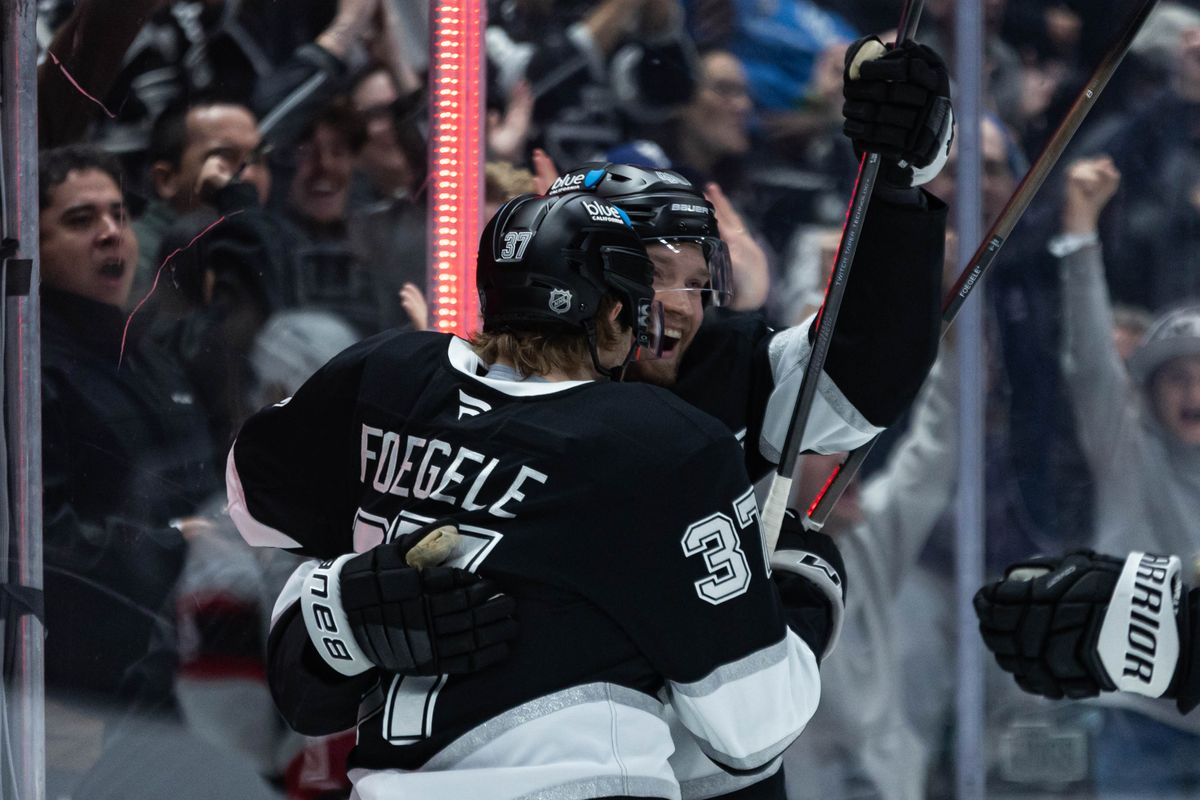 Los Angeles Kings left wing Warren Foegele (37) and right wing Joel Armia (40) celebrates after scoring a goal during an NHL game against the Ottawa Senators on November 24, 2025 in Los Angeles, Calif.