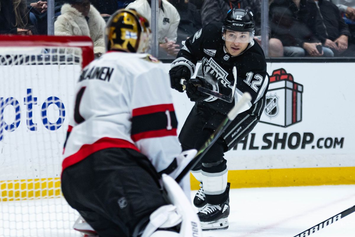 Los Angeles Kings left wing Trevor Moore (12) shoots the puck during an NHL game against the Ottawa Senators on November 24, 2025 in Los Angeles, Calif.