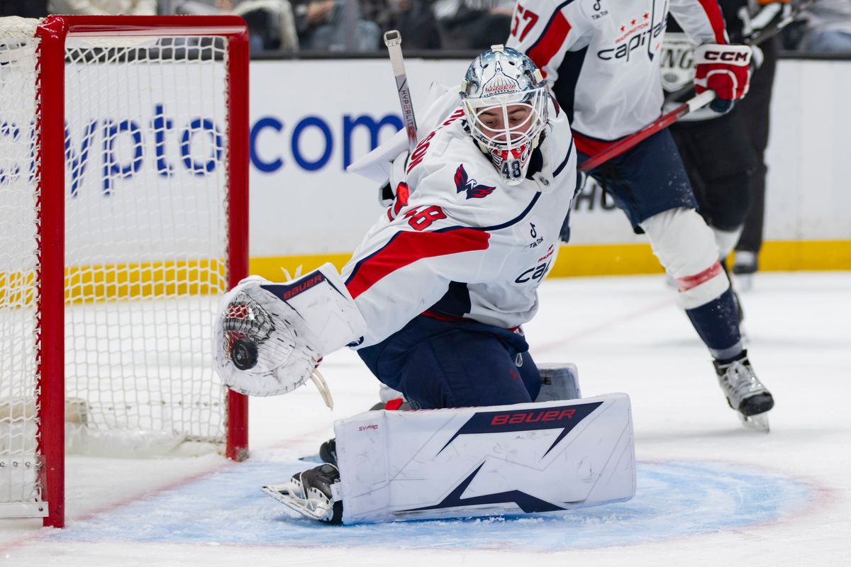 Goaltender Logan Thompson #48 of the Washington Capitals makes a glove save during an NHL hockey game against the Los Angeles Kings, Tuesday December 2, 2025 in Los Angeles, Calif.