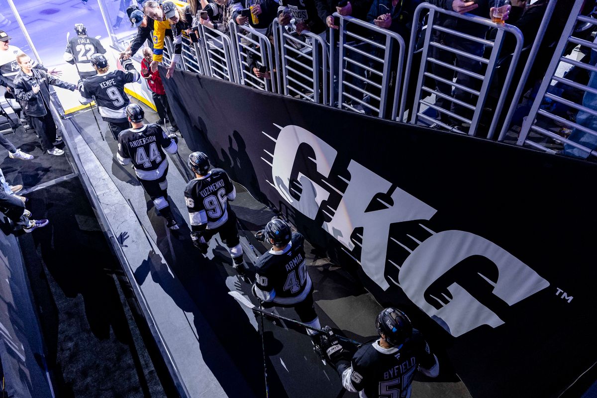 The Los Angeles Kings walk out of the tunnel onto the ice before an NHL hockey game against the Chicago Blackhawks, Thursday December 4, 2025 in Los Angeles, Calif.