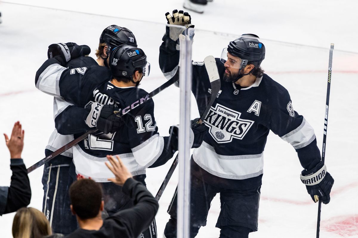 Defenseman Drew Doughty #8 and left wing Trevor Moore #12 of the Los Angeles Kings celebrate a goal during an NHL hockey game against the Chicago Blackhawks, Thursday December 4, 2025 in Los Angeles, Calif.