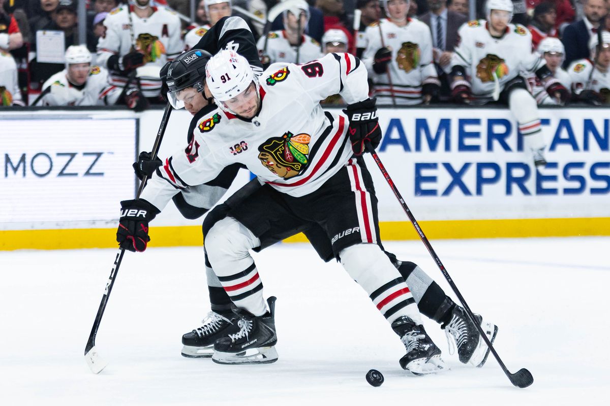 Chicago Blackhawks center Frank Nazar (91) defends the puck during an NHL game against the Los Angeles Kings on December 6, 2025 in Los Angeles, Calif.