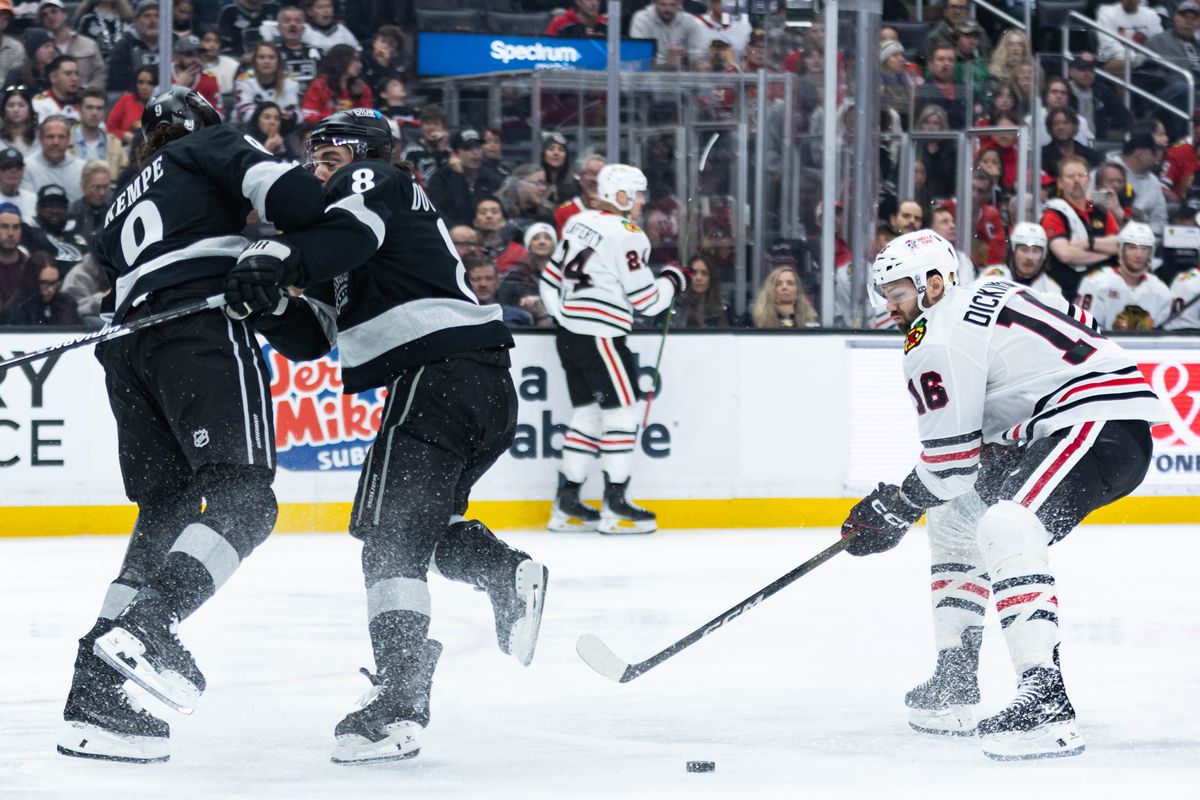 Los Angeles Kings right wing Adrian Kempe (9) and defense Drew Doughty (8) collide during an NHL game against the Chicago Blackhawks on December 6, 2025 in Los Angeles, Calif.
