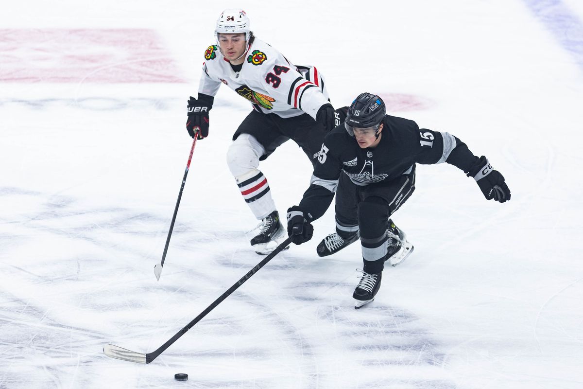Los Angeles Kings center Alex Turcotte (15) defends the puck during an NHL game against the Chicago Blackhawks on December 6, 2025 in Los Angeles, Calif.