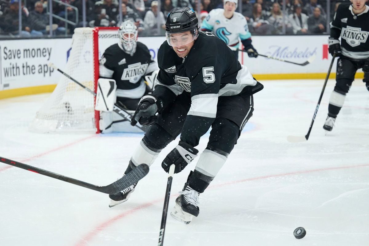 Los Angeles Kings defenseman Cody Ceci (5) blocks the puck against the Kraken at the crypto.com Arena on December 23,2025 in Los Angeles, California.