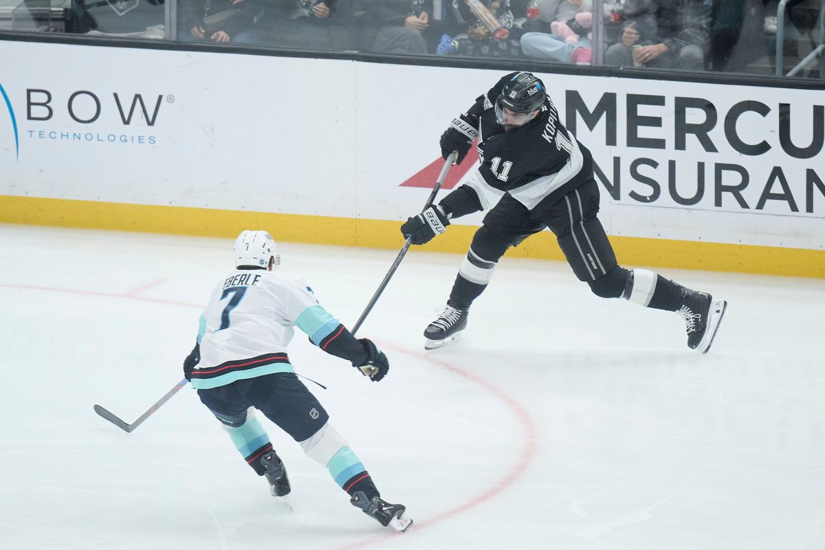 Los Angeles Kings center Anze Kopitar (11) shoots the puck against the Kraken at the crypto.com Arena on December 23,2025 in Los Angeles, California.
