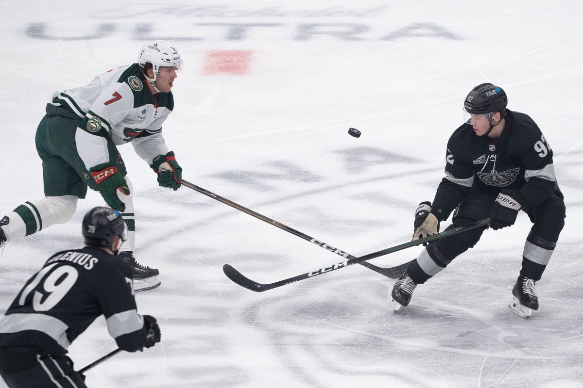 Los Angeles Kings Defender Brandt Clarke (92) tries to steal the puck in the air in a NHL game against the Minnesota Wild at Crypto.com Arena on January 3rd, 2026 in Los Angeles California. Los Angeles Kings Defender Brandt Clarke (92) tries to steal the puck in the air in a NHL game against the Minnesota Wild at Crypto.com Arena on January 3rd, 2026 in Los Angeles California.