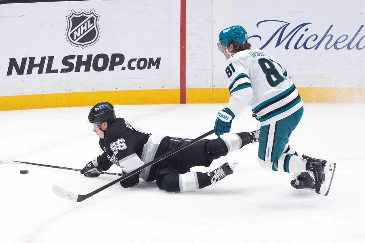 The Los Angeles Kings Left Wing Andrei Kuzmenko (96) gets shoved in the back while going after the puck in a NHL game against the San Jose Sharks at the Crypto Arena on January 7th, 2026 in Los Angeles California.
