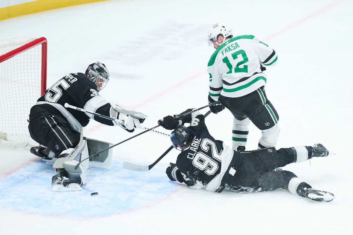 The Los Angeles Kings defender Brandt Clarke (92) and Goaltender Darcy Kuemper (35) defend the goal against the Dallas Stars at the Crypto Arena on January 12th, 2026 in Los Angeles California.