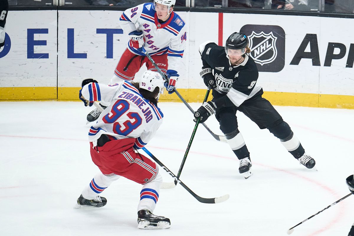 The Los Angeles Kings right wing Adrian Kempe (9) clears the puck against the New York Rangers at the Crypto Arena on January 20th, 2026 in Los Angeles California.