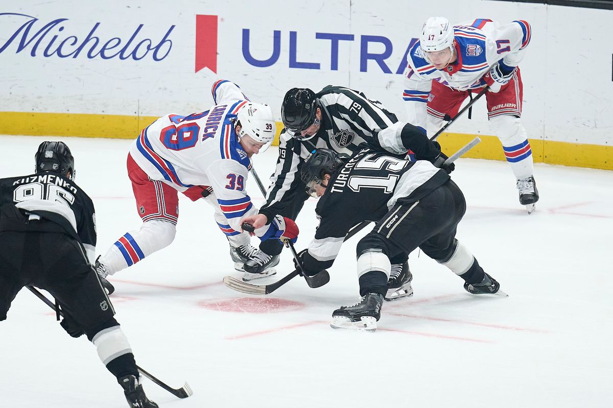 The Los Angeles Kings center Alex Turcotte (15) does a face off against the New York Rangers at the Crypto Arena on January 20th, 2026 in Los Angeles California.