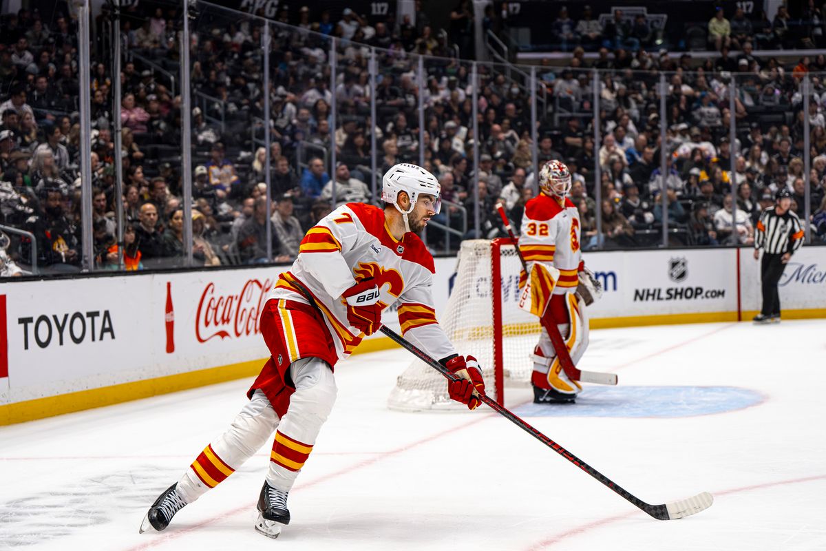 Calgary Flames defenseman Kevin Bahl (7) moving the puck away from Calgary's net during an NHL hockey game against the Los Angeles Kings on February 26th, 2026 in Los Angeles, CA.